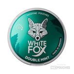 White Fox Double Mint 8mg nicotine pouches in a green tin with white fox logo, designed for discreet placement under lip.