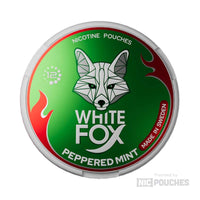 White Fox Peppered Mint product packaging, featuring a fox graphic on green background, promoting 16mg nicotine peppermint experience.